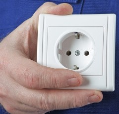 Why does the outlet spark when turning on the appliance?