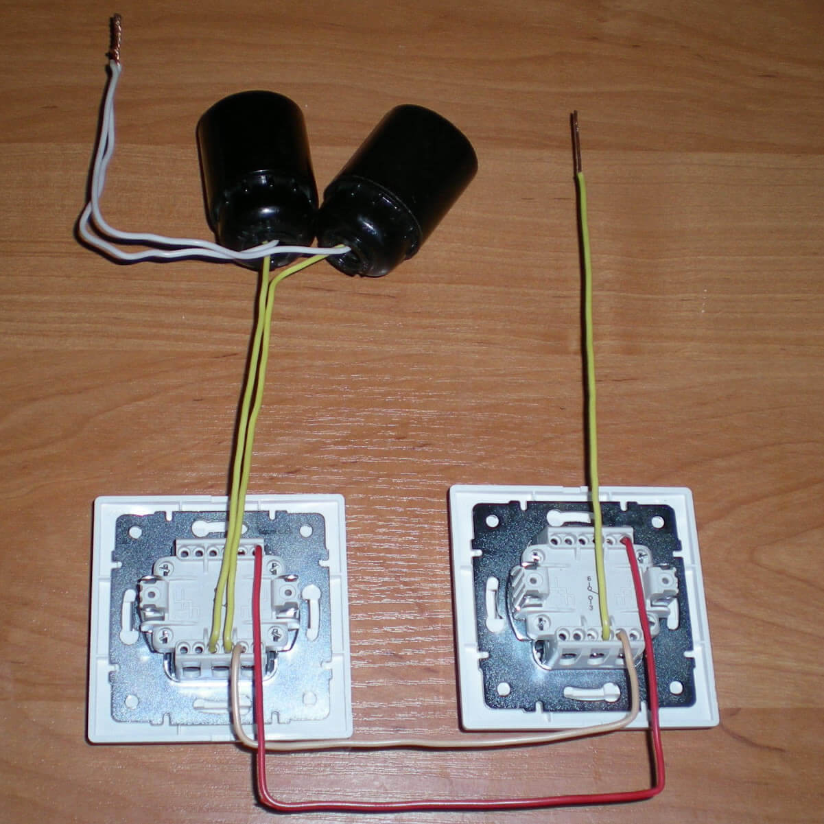 Control of two bulbs from two places