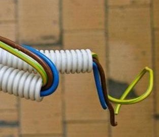 How to route a cable through a corrugated pipe