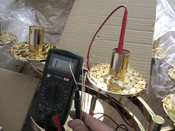 The bell of the lamp with a multimeter