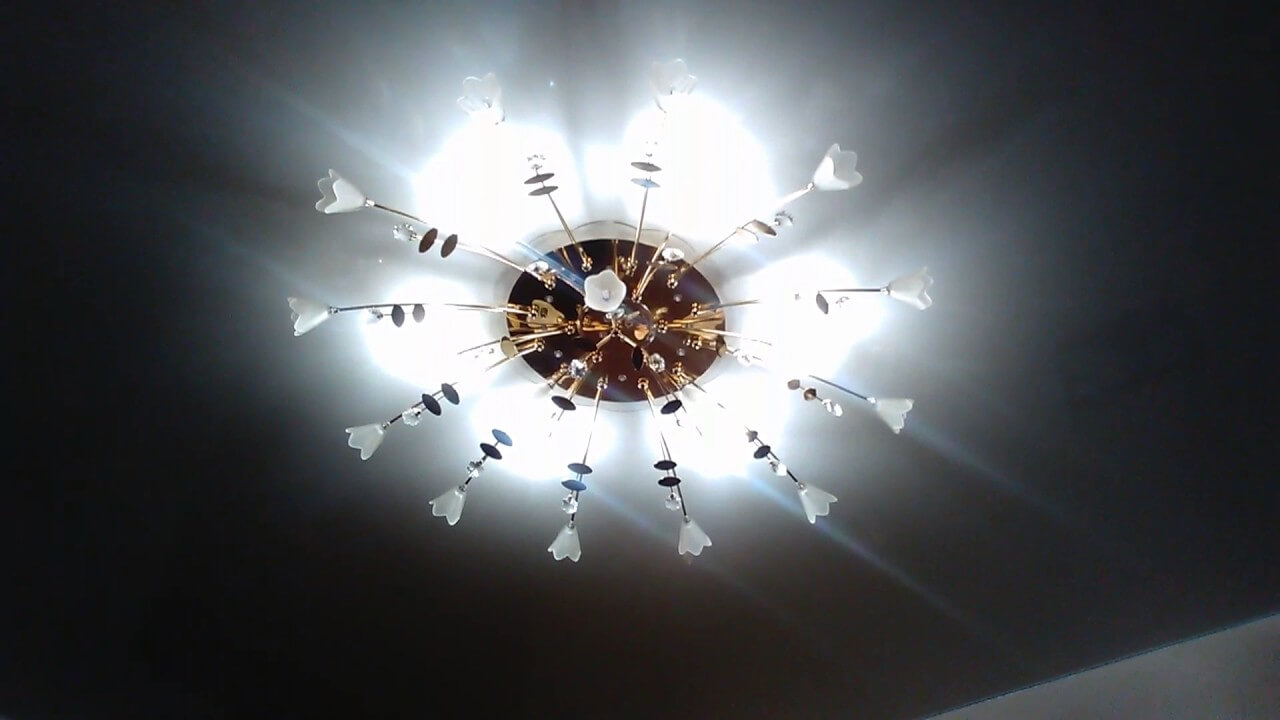 Flickering light bulbs in the chandelier