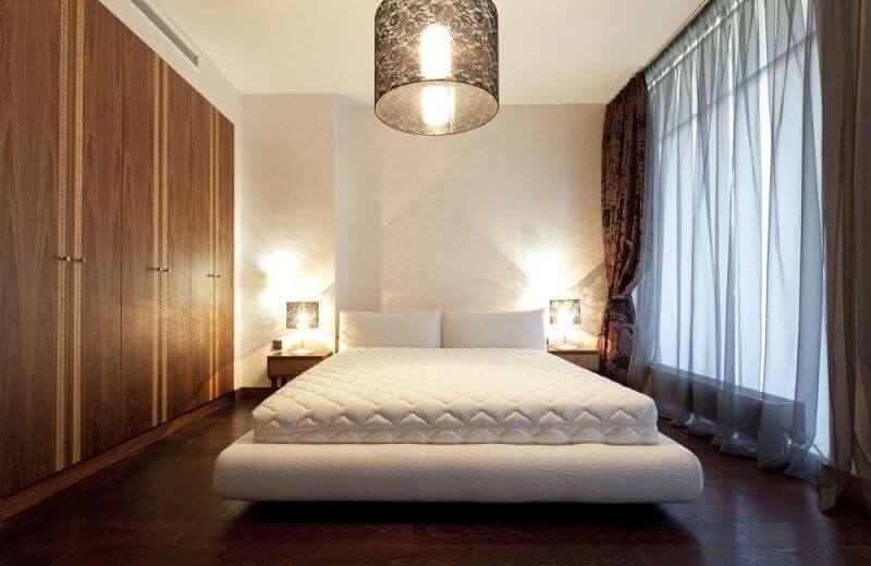 Floor lamps over the bed